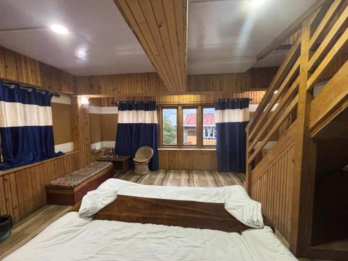 Postel nebo postele na pokoji v ubytování Odyssey's Darap Eco Retreat