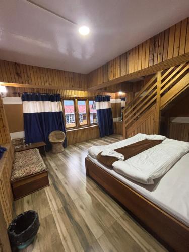 Postel nebo postele na pokoji v ubytování Odyssey's Darap Eco Retreat