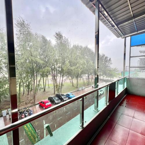 a view of a parking lot from a building at DI TAMBAK 2 Homestay in Pontian Kecil