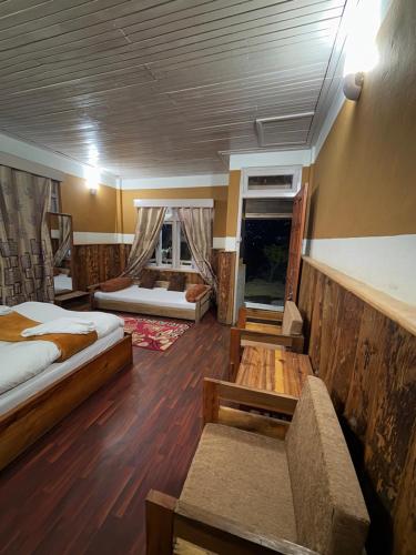 Postel nebo postele na pokoji v ubytování Odyssey's Darap Eco Retreat