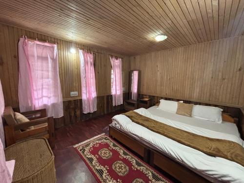 Postel nebo postele na pokoji v ubytování Odyssey's Darap Eco Retreat