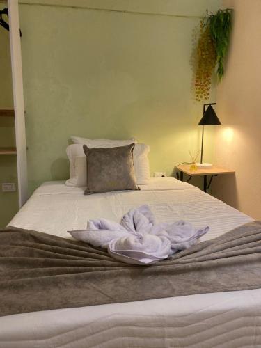 Postel nebo postele na pokoji v ubytování Almabella Hotel