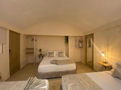 Postel nebo postele na pokoji v ubytování Almabella Hotel