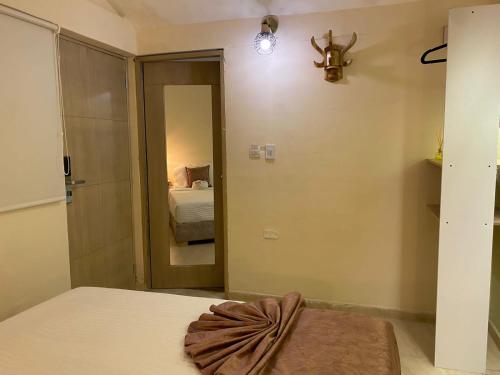 Postel nebo postele na pokoji v ubytování Almabella Hotel