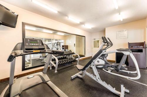 a room with a gym with a treadmill at Quality Inn & Suites University Fort Collins in Fort Collins