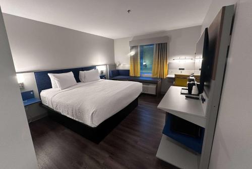 Postel nebo postele na pokoji v ubytování Microtel Inn & Suites by Wyndham Rehoboth Beach