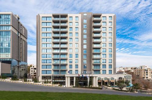a rendering of a large apartment building at Doubletree By Hilton Amman Hotel & Residences in Amman