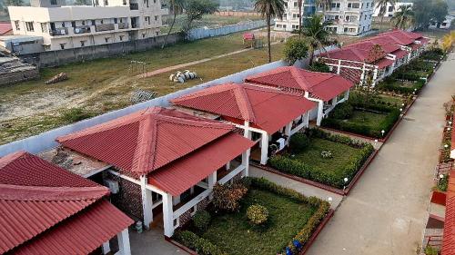 an overhead view of a building with red roofs at Ricardo Beach Resort in Mandarmoni