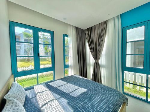 Postel nebo postele na pokoji v ubytování Villa 4Phòng ngủ Novaworld phan thiết