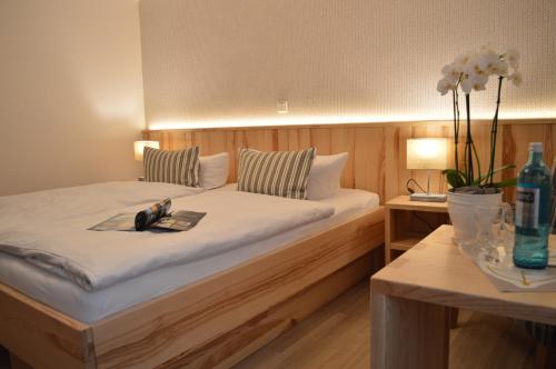Postel nebo postele na pokoji v ubytování Forellenhof Poggel
