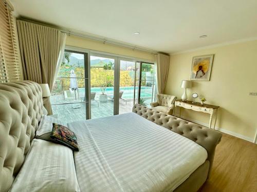 Postel nebo postele na pokoji v ubytování Dolce Vita Villa Memory Bang-Tao Phuket