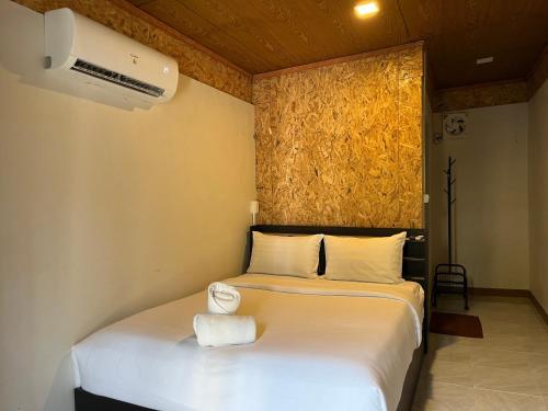 Postel nebo postele na pokoji v ubytování Namthip Homebeach
