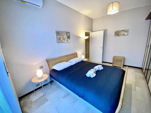 Кровать или кровати в номере Anna Home train Milan Malpensa