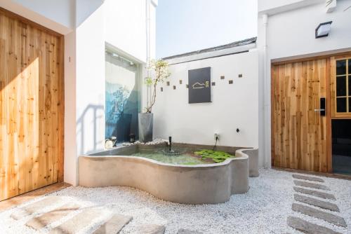 Imagine din galeria proprietății 苏州叙姑苏民宿-拙政园北寺塔地铁站店 în Suzhou