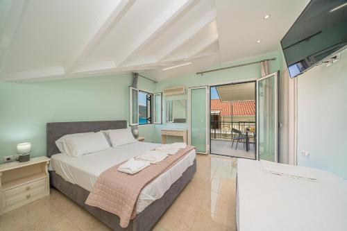 Katil atau katil-katil dalam bilik di Filalithis Studios & Apartments