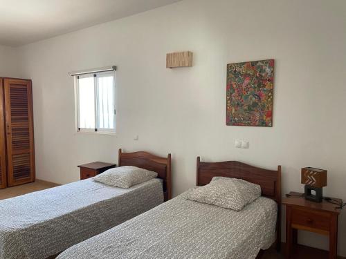 Postel nebo postele na pokoji v ubytování Villa sol e mar