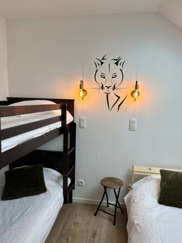 Cama o camas de una habitación en SensUP à 5min de Pairi Daiza