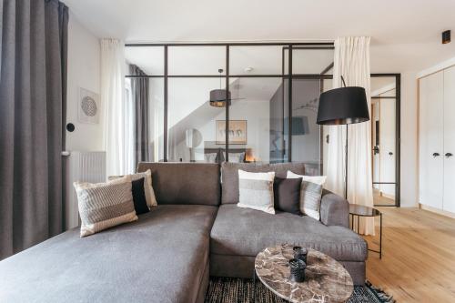 Χώρος καθιστικού στο POSESJA APARTAMENTY & SPA - Posesja Plażowa 4b I