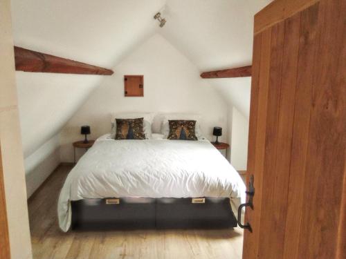 Postel nebo postele na pokoji v ubytování Maison accueillante avec jardin à Selles-sur-Cher