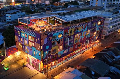 an overhead view of a building at night at The Fig Lobby Bangkok in Bangkok