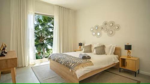 Katil atau katil-katil dalam bilik di Appartements Domaine de Grand Baie