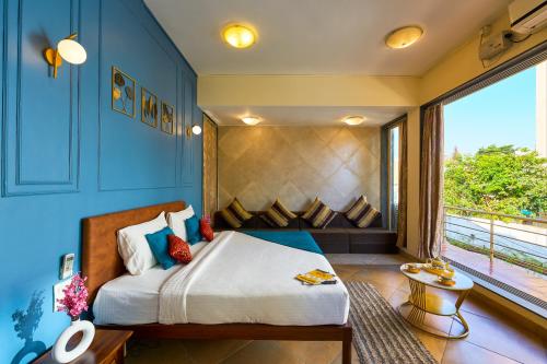 Ένα ή περισσότερα κρεβάτια σε δωμάτιο στο Seven sands I Victoria I 3BHK pool Villa