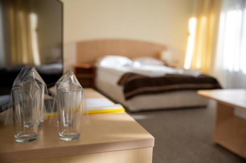 Letto o letti in una camera di Hotel Borovets Edelweiss