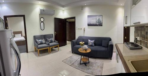 Χώρος καθιστικού στο لاقينا هوم- شقق مخدومة شظاه