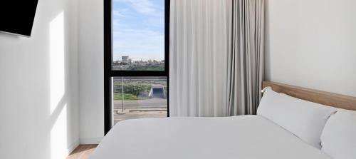 Katil atau katil-katil dalam bilik di B&B HOTEL Valencia Alcàsser
