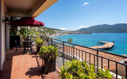 a balcony with a view of a body of water at Casa Nonna Bodrum - Adult Only in Bodrum City