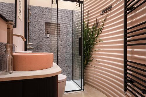 Koupelna v ubytování The Silos by Stamford Holiday Cottages