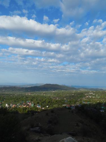 a view of a city from the top of a hill at Paarli Dhara,Bir in Bīr