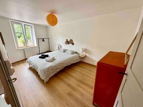 Postel nebo postele na pokoji v ubytování Gîte Olivia - Meuse