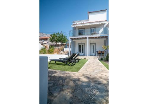 Zahrada ubytování Naiada - Beachfront Luxury Villa