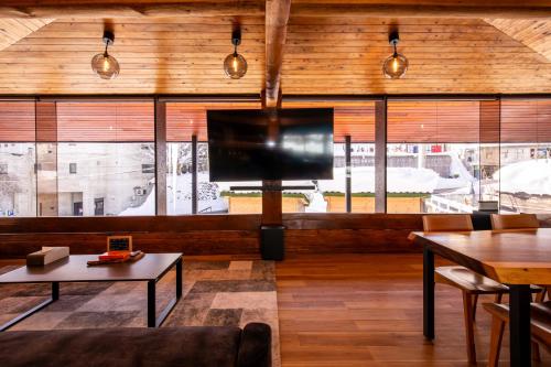 Jaune Chaletにあるテレビまたはエンターテインメントセンター