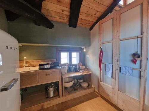 Kuchyň nebo kuchyňský kout v ubytování Apartamento La Buhardilla Selnatur