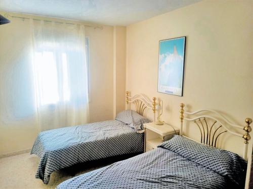 Posteľ alebo postele v izbe v ubytovaní Spacious Apartment in Isla Cristina near Beaches, 115 m²
