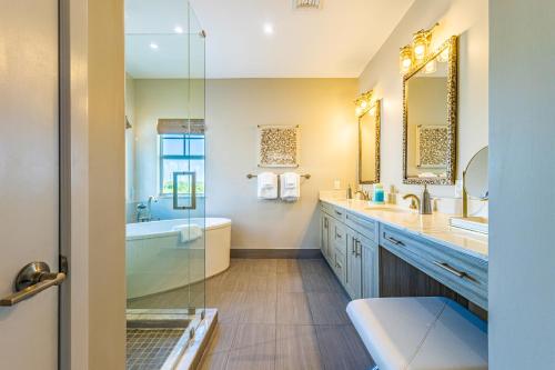 a bathroom with two sinks and a shower at Twilight #32 in Key Largo