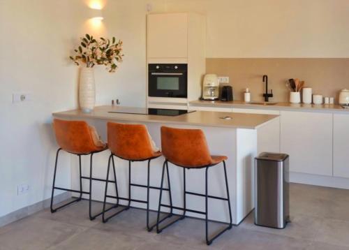 Η κουζίνα ή μικρή κουζίνα στο Villa Jazmyn 26 Blue Bay Golf & Beach Resort