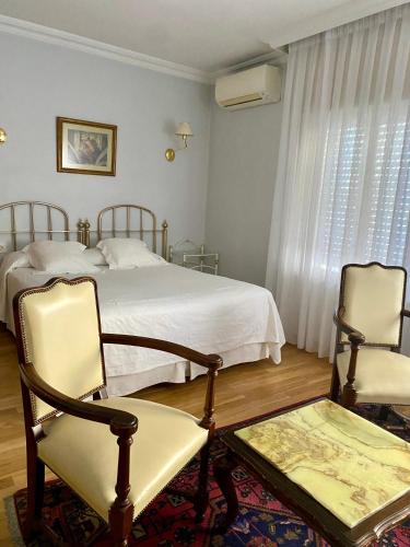 Katil atau katil-katil dalam bilik di Hotel Aranda