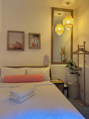 Postel nebo postele na pokoji v ubytování Akap Homestay - Nkd