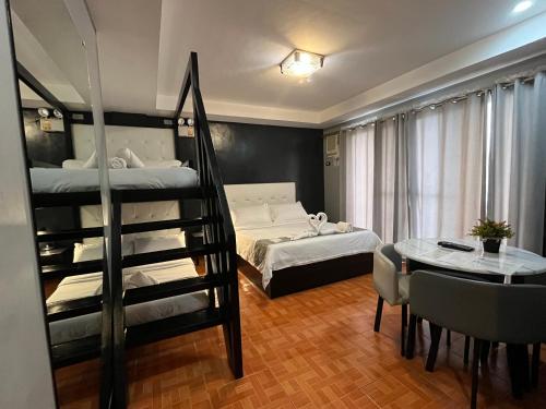 Postel nebo postele na pokoji v ubytování Rangya Hotel