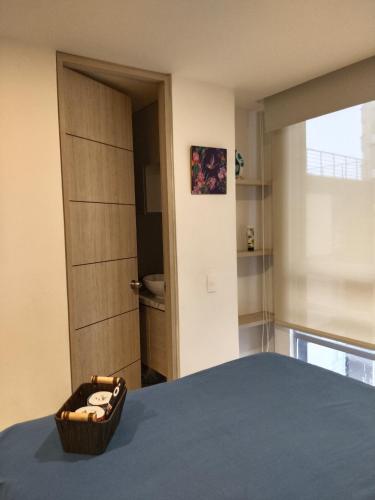 Ένα ή περισσότερα κρεβάτια σε δωμάτιο στο Comoda Suite 1619