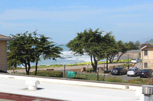 a view of the ocean from the balcony of a house at Cambria Shores Inn in Cambria