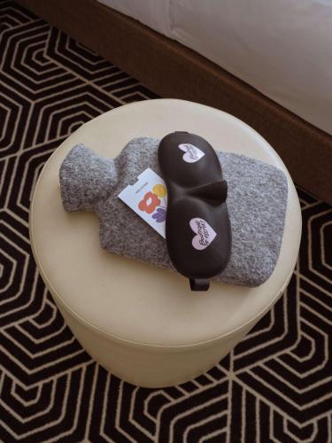 a cake sitting on top of a table at Flemings Hotel Frankfurt Main-Riverside in Frankfurt/Main