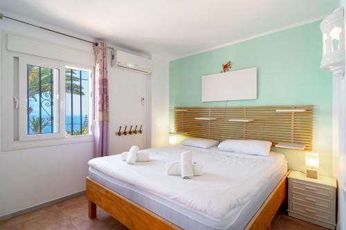 Postel nebo postele na pokoji v ubytování Ladera del Mar 32 Casasol