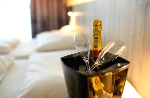 Postel nebo postele na pokoji v ubytování Akadémia Hotel