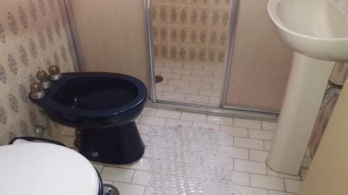 Salle de bains dans l'établissement GUARUJÁ - PRAIA DE PITANGUEIRAS
