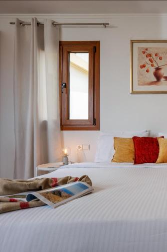 Cama o camas de una habitación en Rocca a Mare Maisonette II