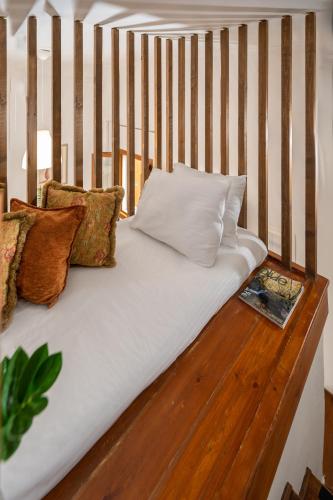 Cama o camas de una habitación en Rocca a Mare Maisonette II